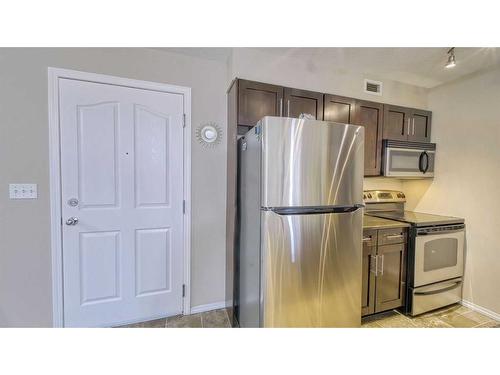 122-355 Taralake Way Ne, Calgary, AB - Indoor Photo Showing Kitchen With Stainless Steel Kitchen