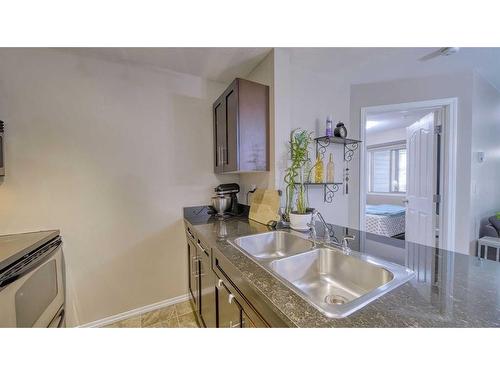 122-355 Taralake Way Ne, Calgary, AB - Indoor Photo Showing Kitchen With Double Sink