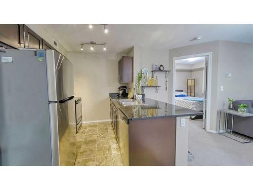 122-355 Taralake Way Ne, Calgary, AB - Indoor Photo Showing Kitchen With Double Sink