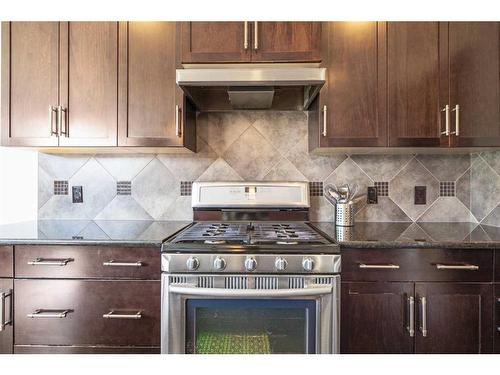 393 River Heights Drive, Cochrane, AB - Indoor Photo Showing Kitchen