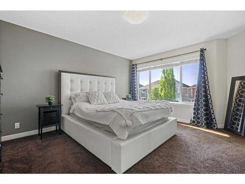 393 River Heights Drive, Cochrane, AB - Indoor Photo Showing Bedroom