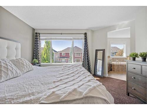 393 River Heights Drive, Cochrane, AB - Indoor Photo Showing Bedroom