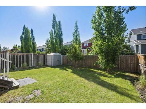 393 River Heights Drive, Cochrane, AB - Outdoor With Backyard