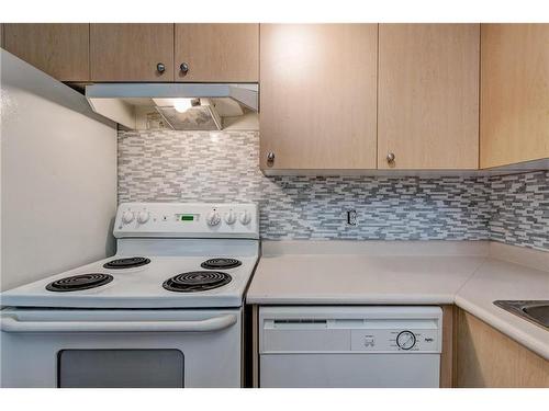 311-1111 6 Avenue Sw, Calgary, AB - Indoor Photo Showing Kitchen