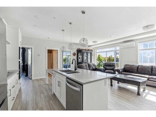 221-400 Auburn Meadows Common Se, Calgary, AB - Indoor Photo Showing Kitchen With Double Sink With Upgraded Kitchen