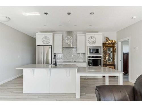 221-400 Auburn Meadows Common Se, Calgary, AB - Indoor Photo Showing Kitchen With Upgraded Kitchen