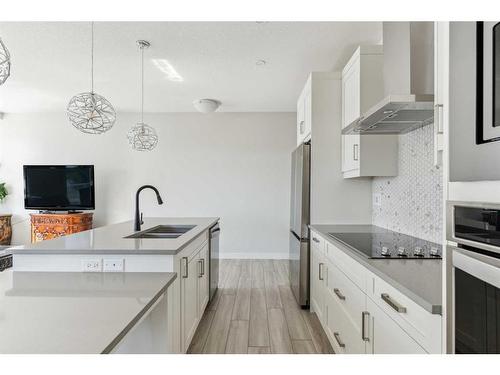 221-400 Auburn Meadows Common Se, Calgary, AB - Indoor Photo Showing Kitchen With Double Sink With Upgraded Kitchen