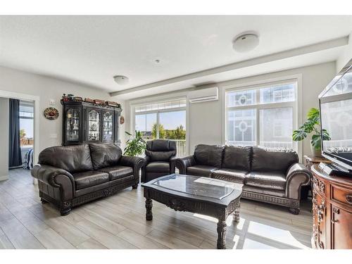 221-400 Auburn Meadows Common Se, Calgary, AB - Indoor Photo Showing Living Room