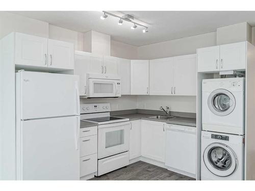 1305-10 Brentwood Common Nw, Calgary, AB - Indoor Photo Showing Laundry Room