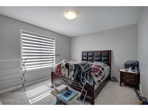 871 Carrington Boulevard Nw, Calgary, AB - Indoor Photo Showing Bedroom