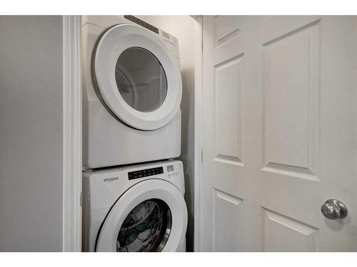 871 Carrington Boulevard Nw, Calgary, AB - Indoor Photo Showing Laundry Room