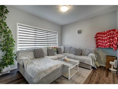 871 Carrington Boulevard Nw, Calgary, AB - Indoor Photo Showing Living Room