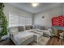 871 Carrington Boulevard Nw, Calgary, AB  - Indoor Photo Showing Living Room 