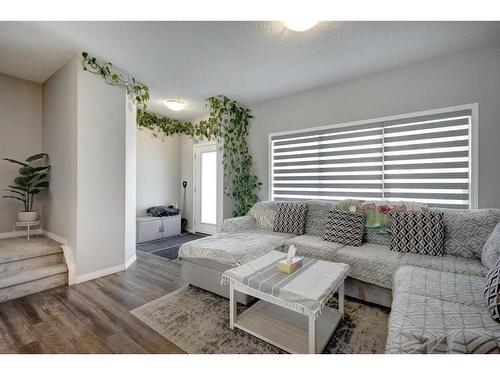 871 Carrington Boulevard Nw, Calgary, AB - Indoor Photo Showing Living Room