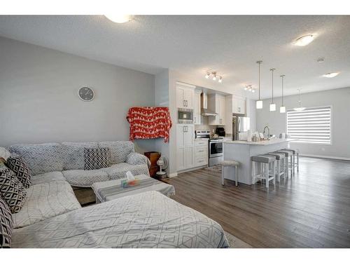 871 Carrington Boulevard Nw, Calgary, AB - Indoor Photo Showing Living Room