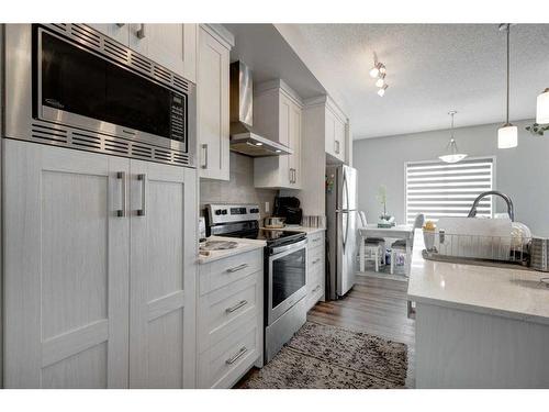 871 Carrington Boulevard Nw, Calgary, AB - Indoor Photo Showing Kitchen With Stainless Steel Kitchen