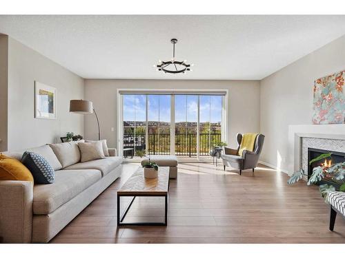 246 Sage Meadows Green Nw, Calgary, AB - Indoor Photo Showing Living Room With Fireplace