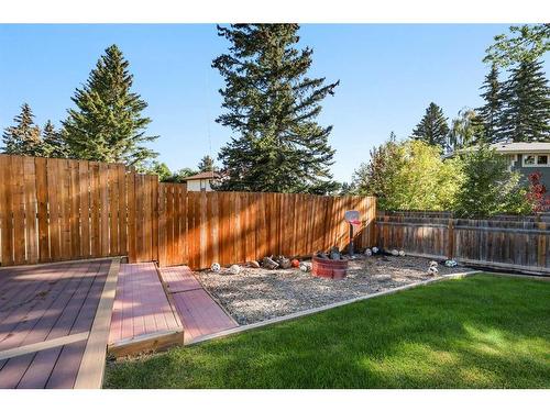 210 Canterbury Place Sw, Calgary, AB - Outdoor With Backyard