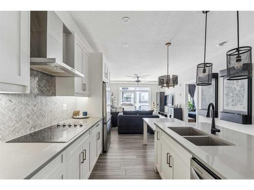 223-400 Auburn Meadows Common Se, Calgary, AB - Indoor Photo Showing Kitchen With Double Sink With Upgraded Kitchen