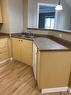 8119-304 Mackenzie Way Sw, Airdrie, AB  - Indoor Photo Showing Kitchen With Double Sink 