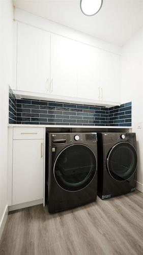 1173 Iron Ridge Avenue, Crossfield, AB - Indoor Photo Showing Laundry Room