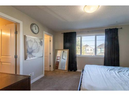 45 Red Embers Row Ne, Calgary, AB - Indoor Photo Showing Bedroom