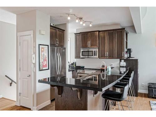 2-517 5 Street Ne, Calgary, AB - Indoor Photo Showing Kitchen With Stainless Steel Kitchen