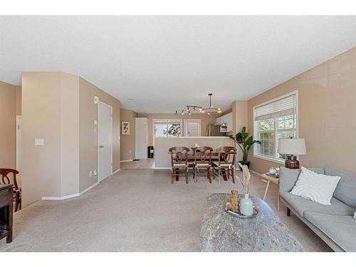 286 Tuscany Springs Boulevard Nw, Calgary, AB - Indoor Photo Showing Living Room