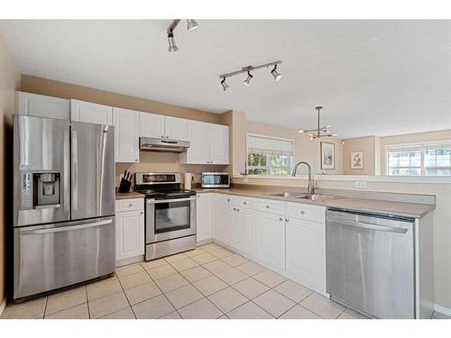 286 Tuscany Springs Boulevard Nw, Calgary, AB - Indoor Photo Showing Kitchen With Double Sink