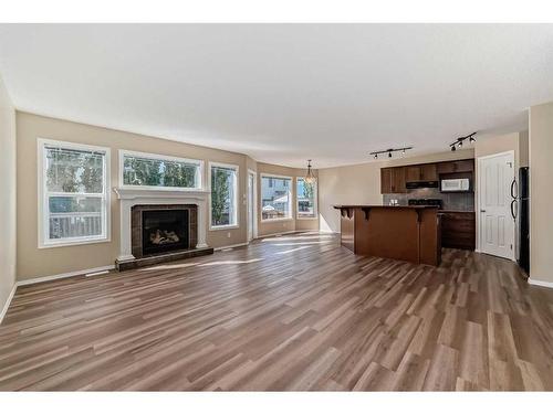 273 New Brighton Lane Se, Calgary, AB - Indoor Photo Showing Living Room With Fireplace