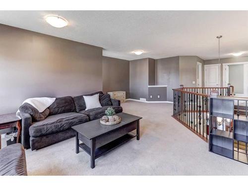 412 Morningside Crescent Sw, Airdrie, AB - Indoor Photo Showing Living Room