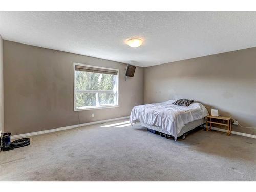 412 Morningside Crescent Sw, Airdrie, AB - Indoor Photo Showing Bedroom