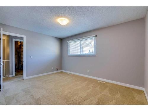 902-2200 Woodview Drive Sw, Calgary, AB - Indoor Photo Showing Other Room