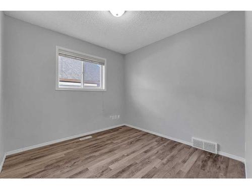 163 Taravista Drive Ne, Calgary, AB - Indoor Photo Showing Bedroom