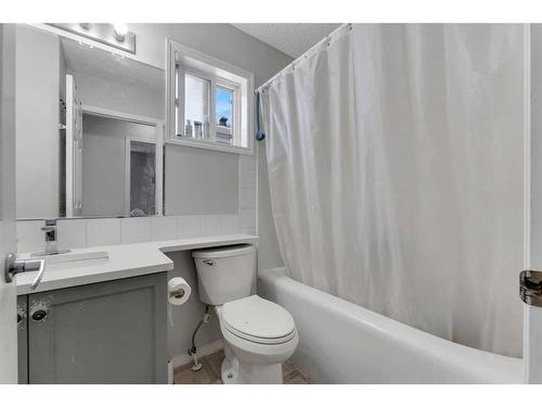 163 Taravista Drive Ne, Calgary, AB - Indoor Photo Showing Kitchen With Double Sink