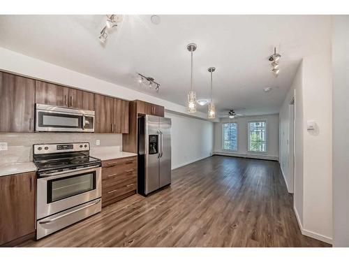 2319-99 Copperstone Park Se, Calgary, AB - Indoor Photo Showing Kitchen With Stainless Steel Kitchen With Upgraded Kitchen