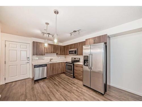 2319-99 Copperstone Park Se, Calgary, AB - Indoor Photo Showing Kitchen With Stainless Steel Kitchen