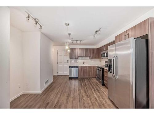 2319-99 Copperstone Park Se, Calgary, AB - Indoor Photo Showing Kitchen With Stainless Steel Kitchen With Upgraded Kitchen