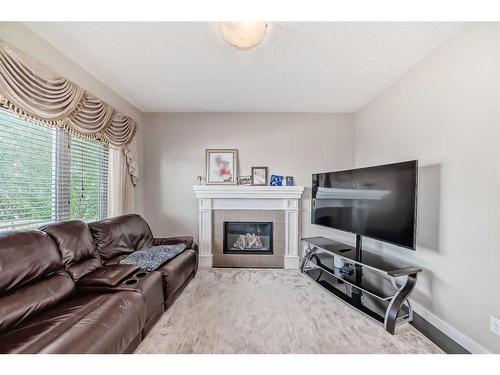 158 Sage Valley Road Nw, Calgary, AB - Indoor Photo Showing Living Room With Fireplace