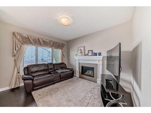 158 Sage Valley Road Nw, Calgary, AB - Indoor Photo Showing Living Room With Fireplace