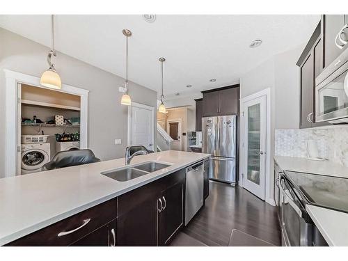 158 Sage Valley Road Nw, Calgary, AB - Indoor Photo Showing Kitchen With Double Sink With Upgraded Kitchen