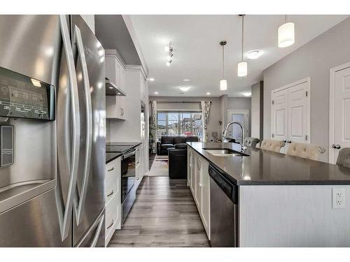 851 Carrington Boulevard Nw, Calgary, AB - Indoor Photo Showing Kitchen With Stainless Steel Kitchen With Double Sink With Upgraded Kitchen