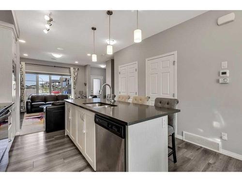 851 Carrington Boulevard Nw, Calgary, AB - Indoor Photo Showing Kitchen With Double Sink With Upgraded Kitchen