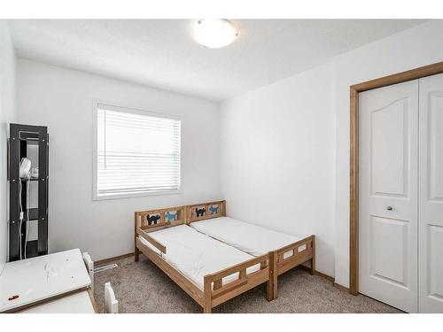 89 Cramond Crescent Se, Calgary, AB - Indoor Photo Showing Bedroom