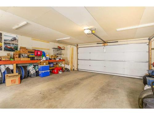 267 Silverado Drive Sw, Calgary, AB - Indoor Photo Showing Garage