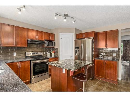 267 Silverado Drive Sw, Calgary, AB - Indoor Photo Showing Kitchen With Double Sink