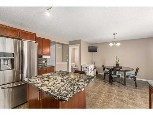 267 Silverado Drive Sw, Calgary, AB - Indoor Photo Showing Kitchen With Upgraded Kitchen