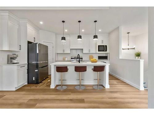 13 Drake Landing Square, Okotoks, AB - Indoor Photo Showing Kitchen