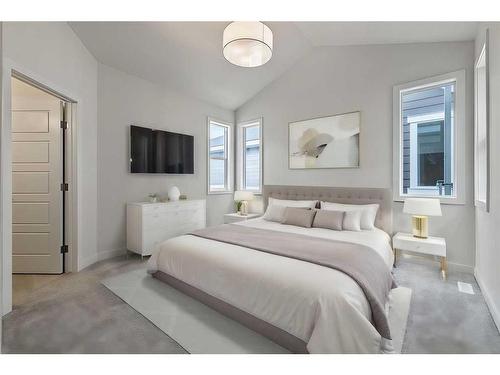 13 Drake Landing Square, Okotoks, AB - Indoor Photo Showing Bedroom