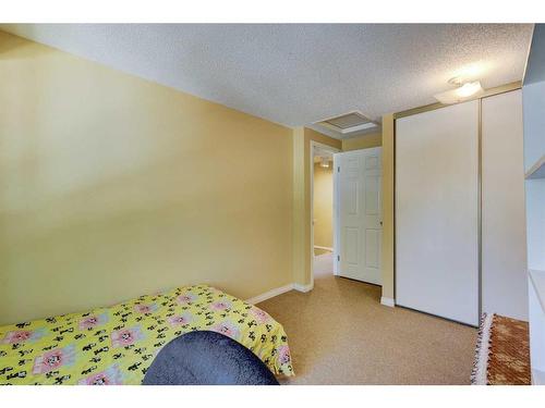 106 Woodborough Terrace Sw, Calgary, AB - Indoor Photo Showing Bedroom